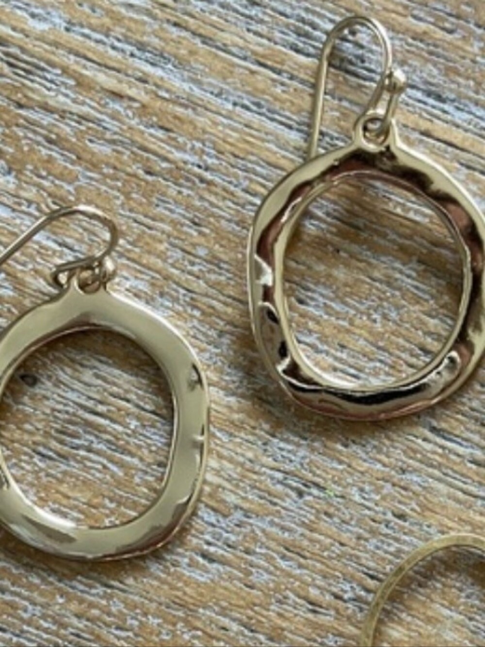 Hammered, organically shaped Dangling Hoops In Waterproof Gold Plate